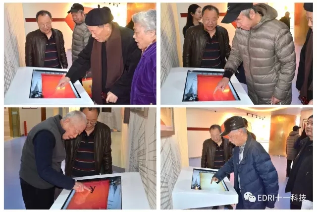 老领导和大师纷纷在签名台前签名.webp.jpg